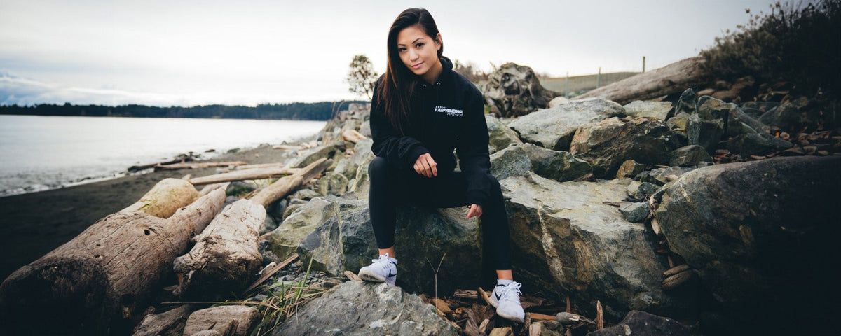 Girl wearing Happy Endings Black Hoodie.