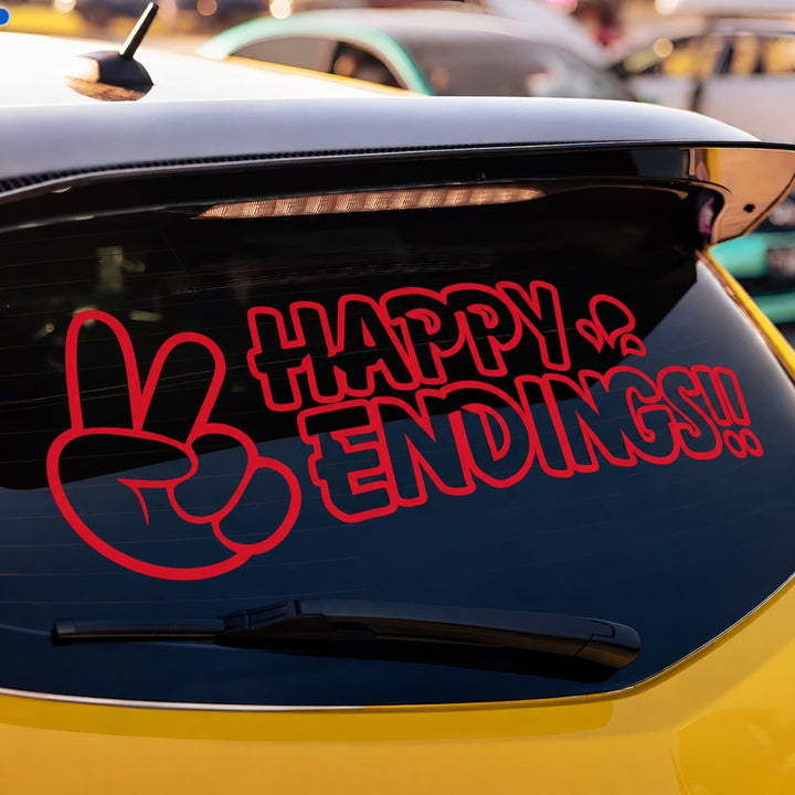 Red decal on a car window showing a peace sign and the text HAPPY ENDINGS!!.