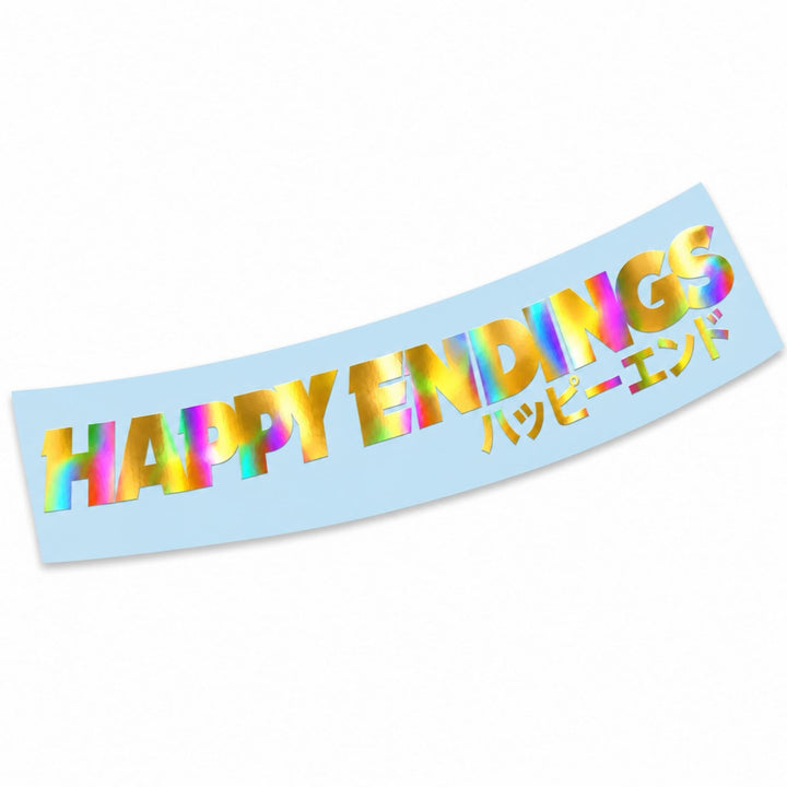 A light blue banner featuring the text HAPPY ENDINGS in iridescent letters and Japanese script.