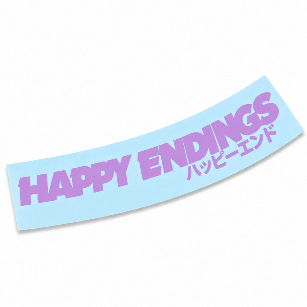 A light blue banner with the purple text HAPPY ENDINGS and its Japanese translation.