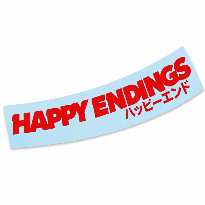 A curved sticker that reads HAPPY ENDINGS in English and Japanese.