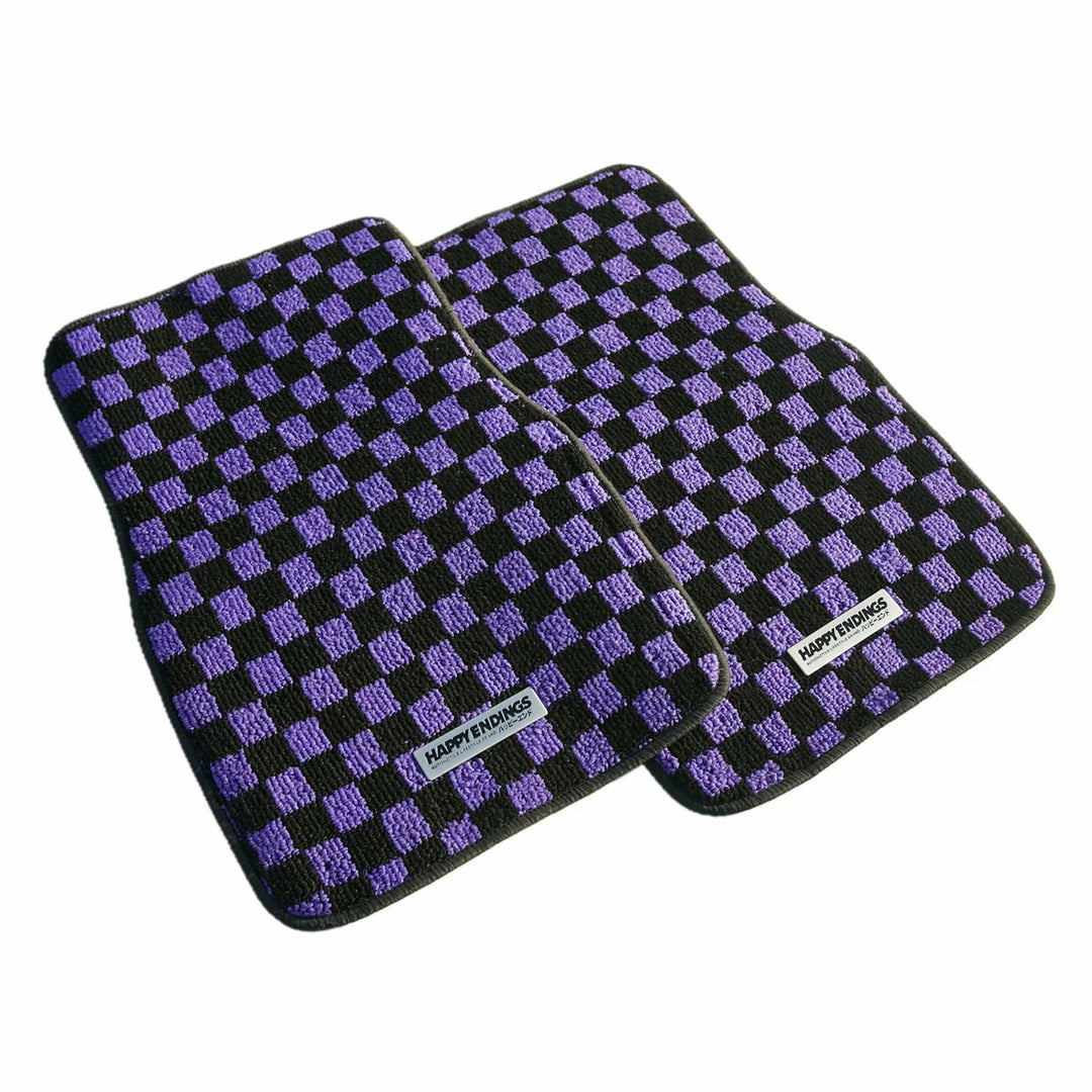Two rectangular mats with a black and purple checkerboard pattern and a Happy...