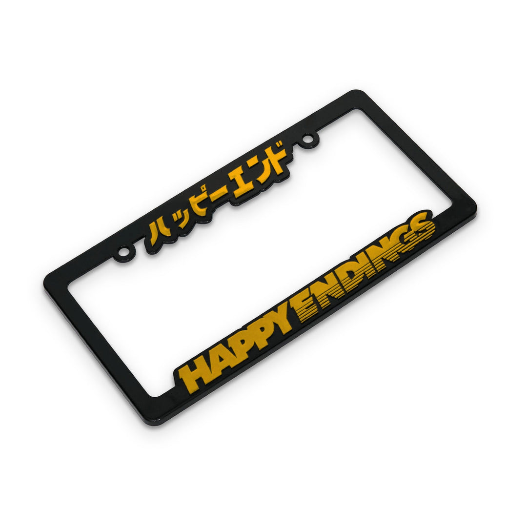 License Plate Frame - Gold Chrome Lettering (Black Frame) - Happy Endings - A...