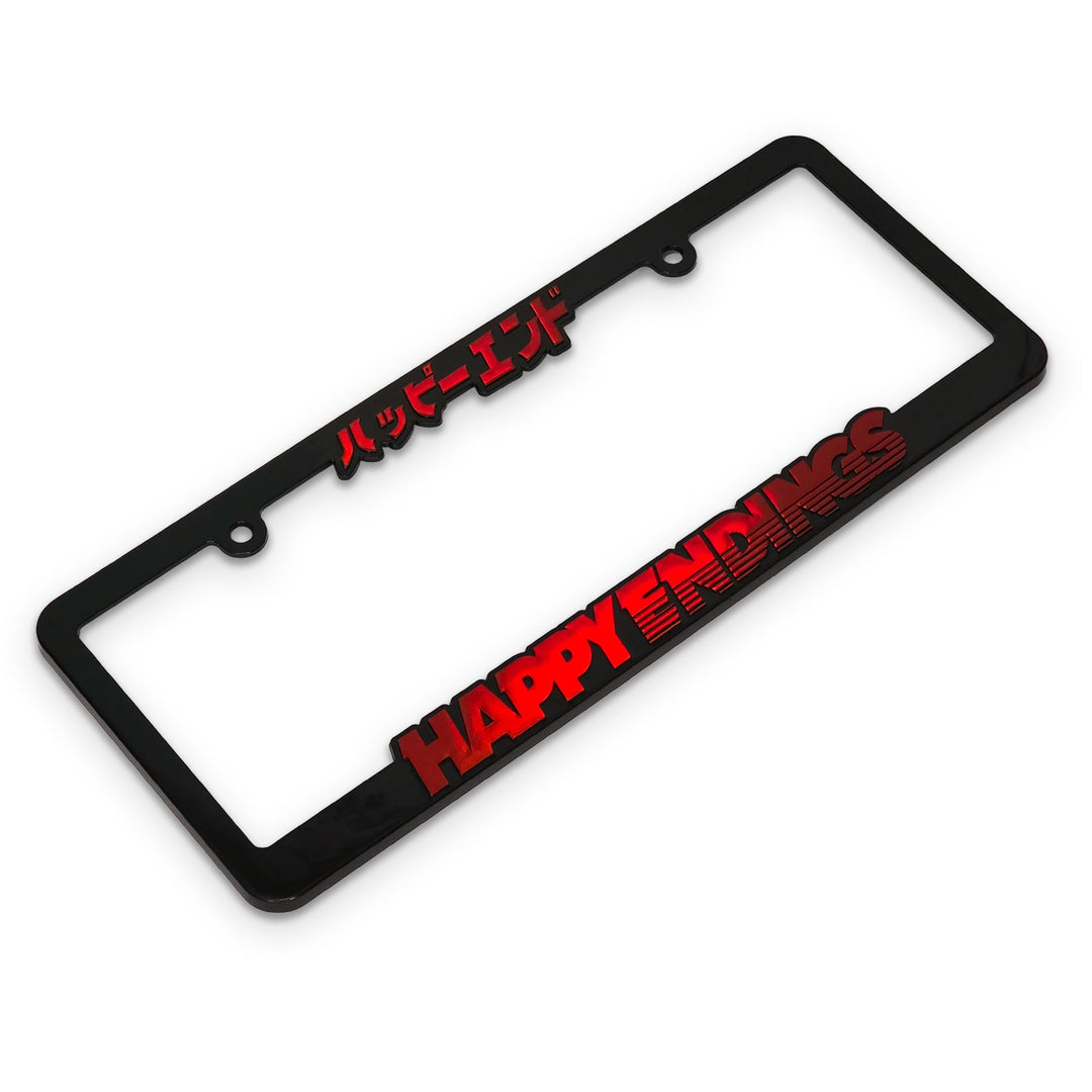 Black license plate frame with red text on a black background