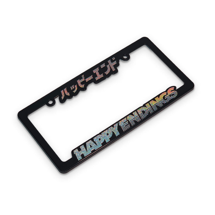 Black license plate frame with 'HAPPY ENDINGS' text on a white background