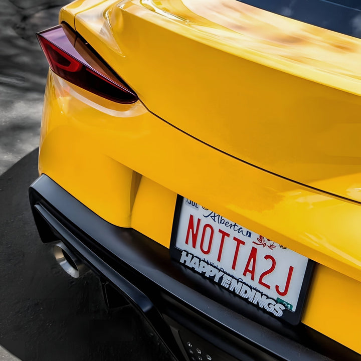 License Plate Frame - White (Black Frame) - Happy Endings - Automotive & Lifestyle Brand