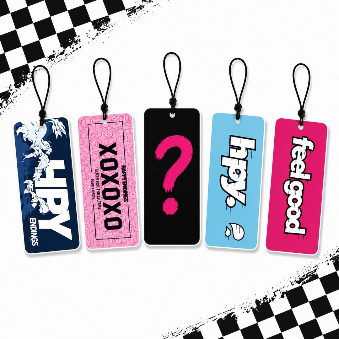 Mystery Happy Endings air freshener, five tag designs with a black question m...