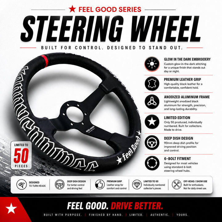 Black deep-dish steering wheel with white embroidered stitching, red center stripe, matte black 3-spoke design, and JDM-inspired “feel good” script embroidery.
