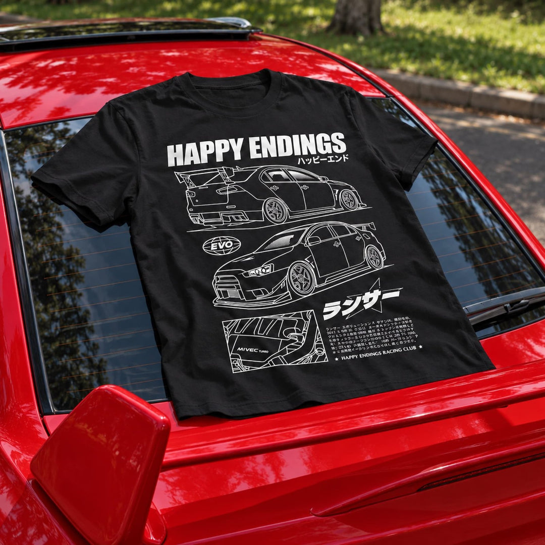 Black t-shirt featuring line-art graphics of a Mitsubishi Lancer Evolution an...