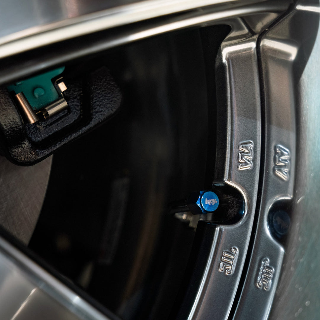 Titanium - Valve Stem Caps - Happy Endings - Automotive & Lifestyle Brand