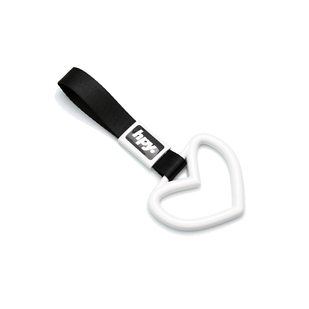 White heart tsurikawa handle with black strap on a white background