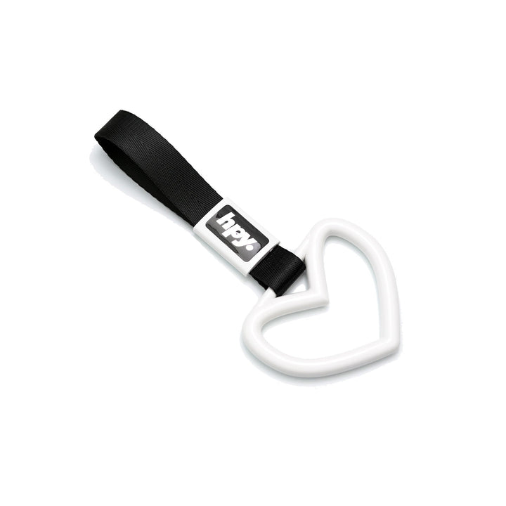 White heart tsurikawa handle with black strap on a white background