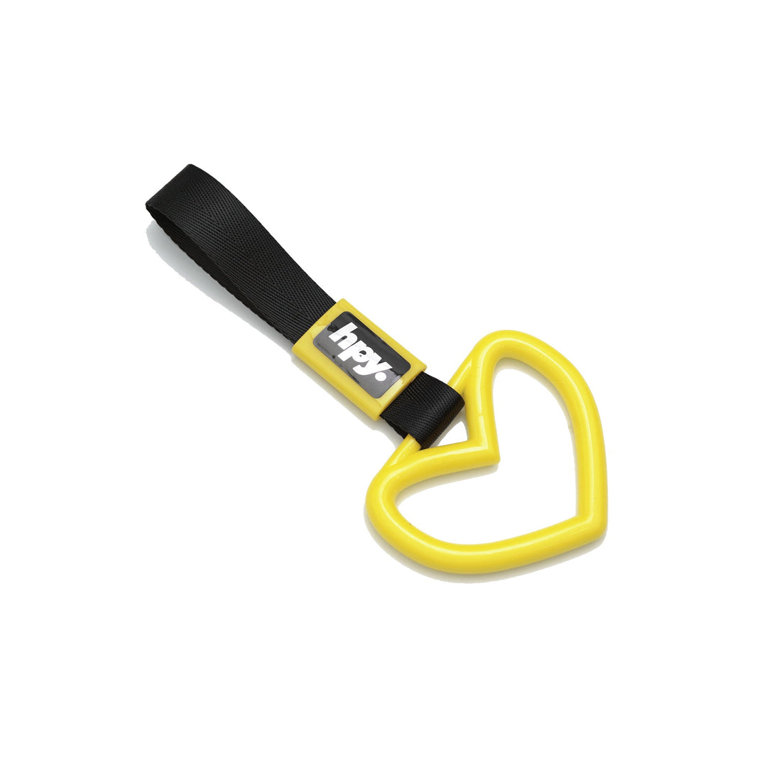Yellow heart tsurikawa handle with black strap on a white background