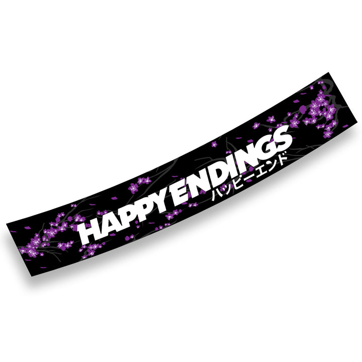Sticker with 'HAPPY ENDINGS' text and purple floral design on a black background